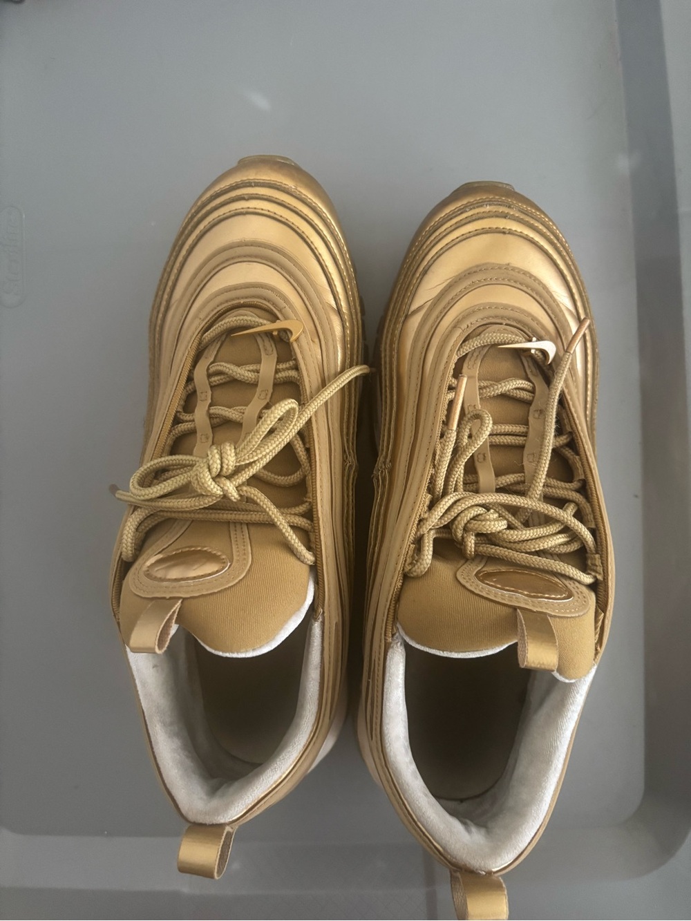 Nike Air Max 97s in Gold